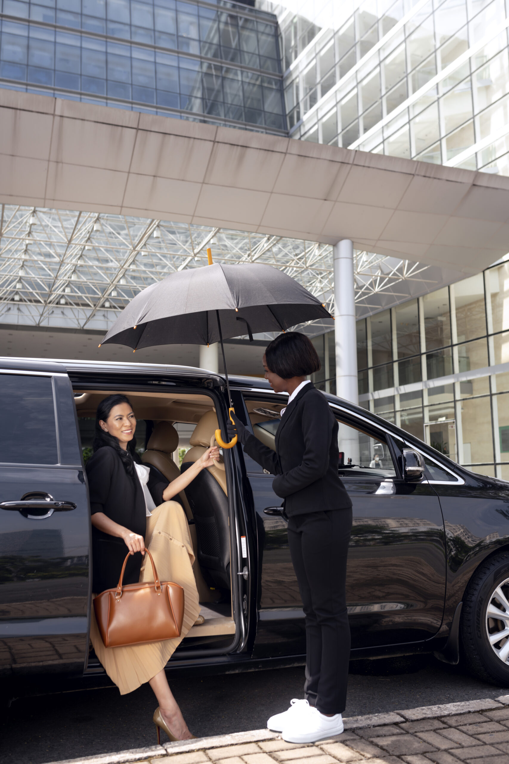 businesswoman getting taxi cab (1)